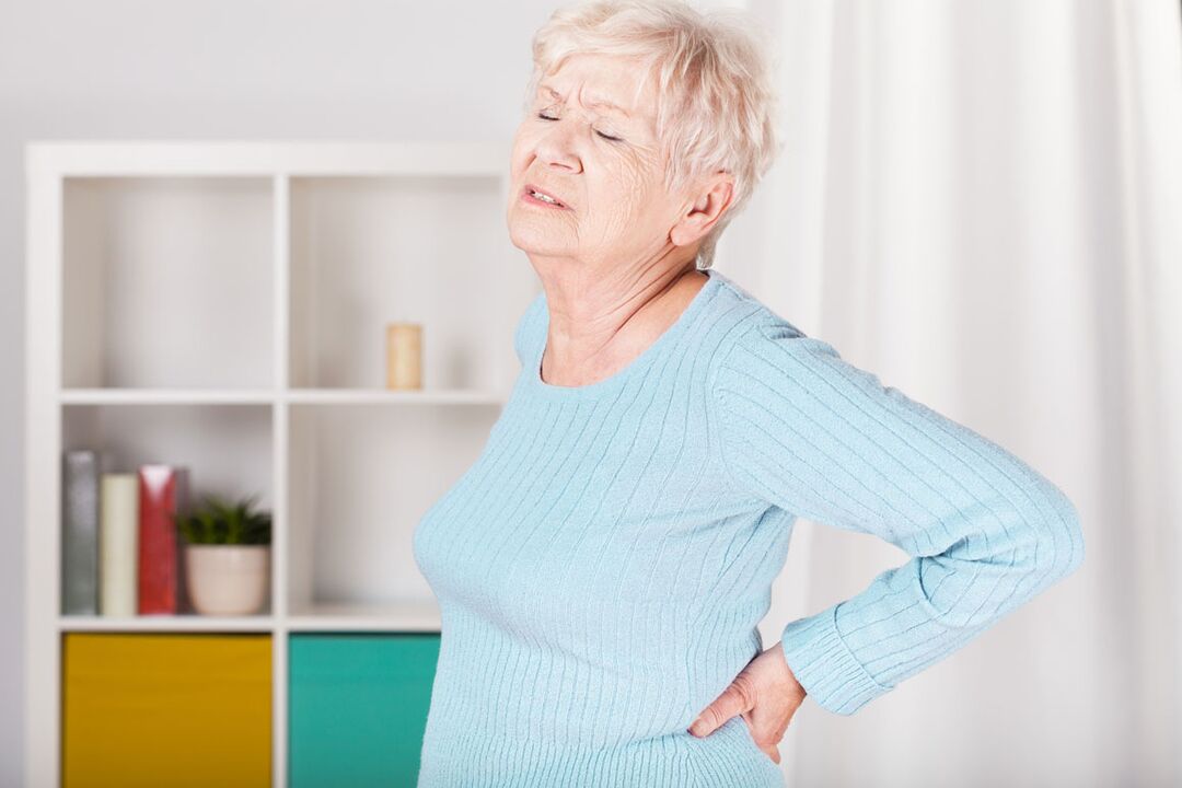 Low back pain in women can cause osteochondrosis