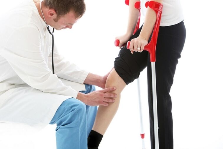 Patient knee check with knee joint arthrosis